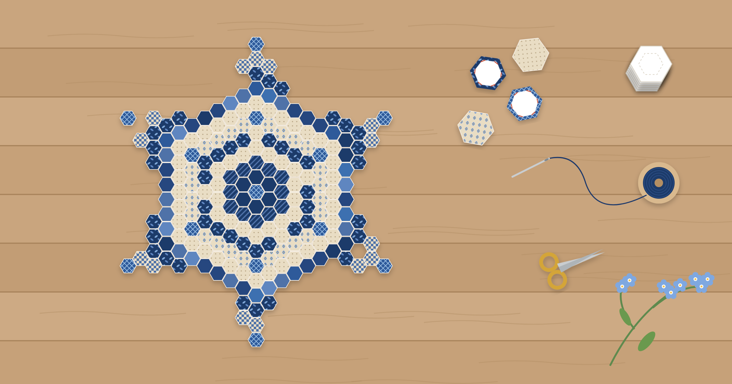 Forget Me Not English paper pieced hexagon quilt in progress, a navy and beige star medallion surrounded by basted hexagons, paper templates, needle and thread, and forget-me-not flowers