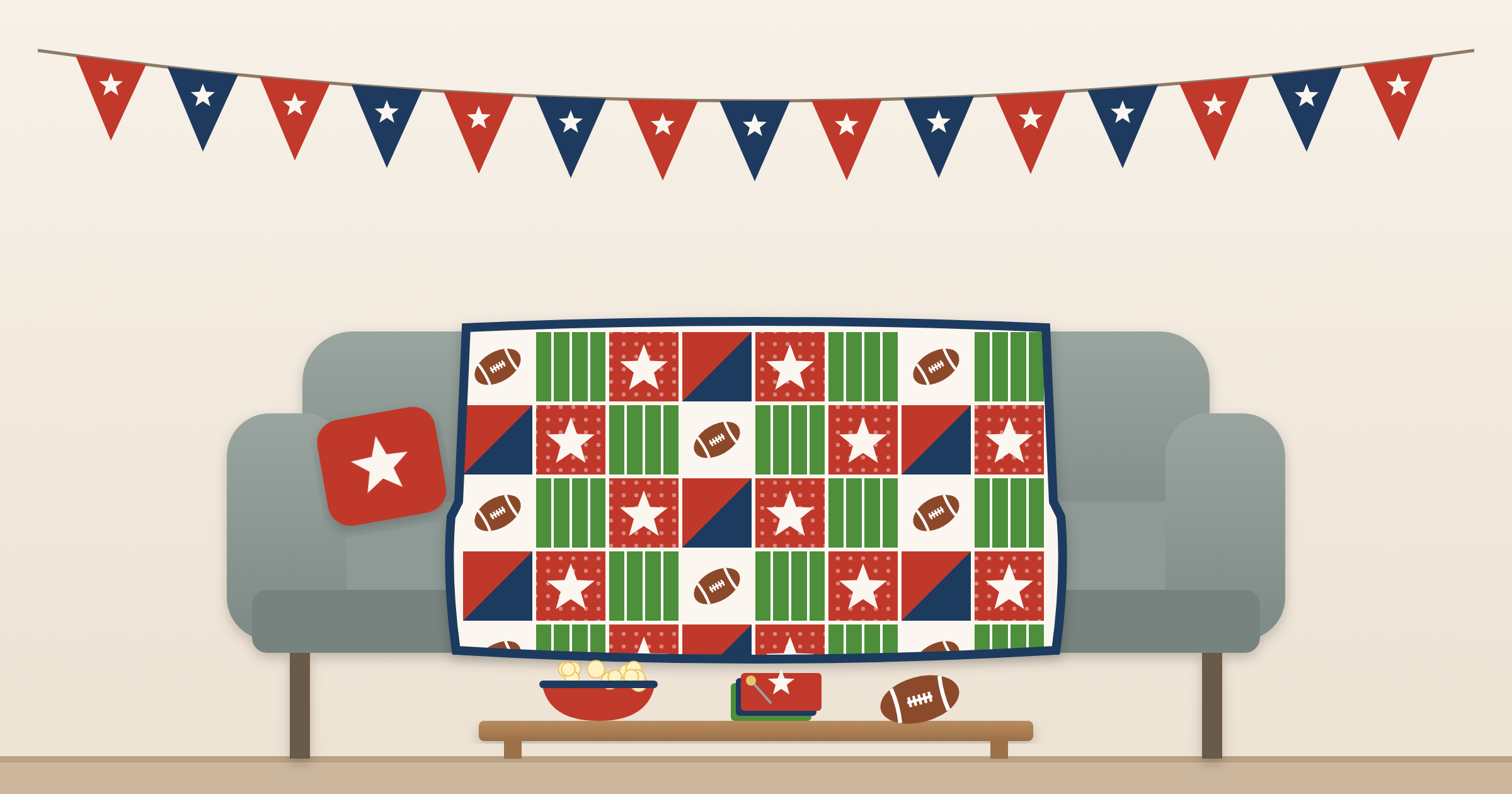 Football themed patchwork quilt with football, field, and star blocks in navy, red, and green draped over a sofa under a pennant banner, with popcorn, a football, and quilt blocks on the coffee table
