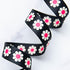 black daisy floral webbing with hot pink centers for bag straps