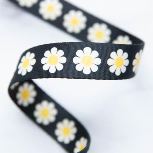 black daisy webbing with yellow flower centers for bag straps
