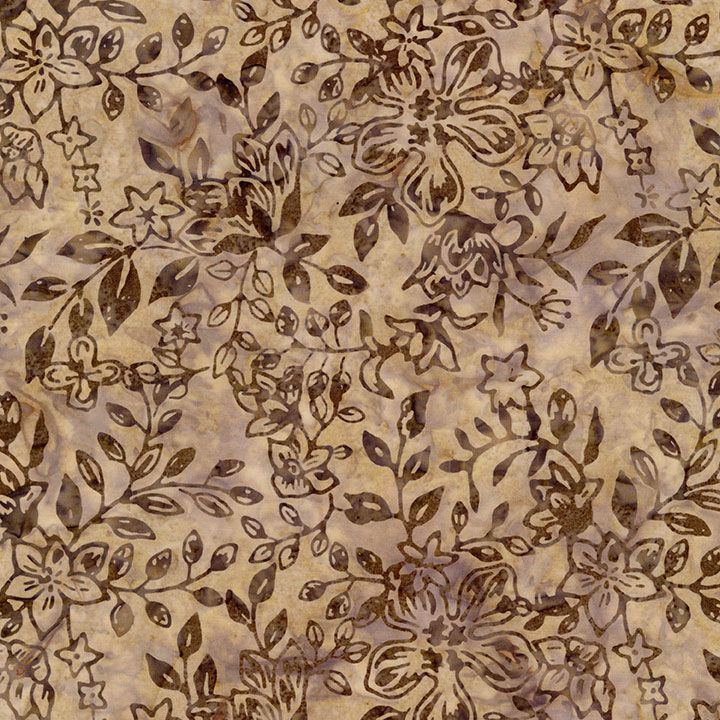 Brown and taupe floral batik fabric featuring leafy vines and botanical flowers on a nutmeg background by Timeless Treasures.