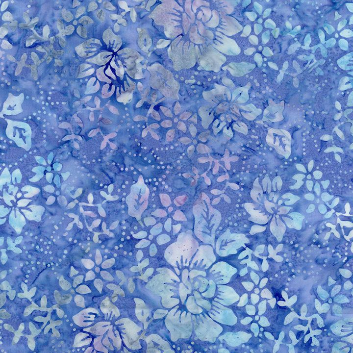 Blue and lavender floral batik fabric featuring botanical flowers and leaves from the Tonga Summer Florals collection by Timeless Treasures.
