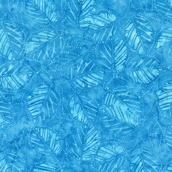 Blue tropical batik fabric featuring layered palm leaves and botanical foliage in aqua and pool blue tones from the Tonga Tropical Greenery collection by Timeless Treasures.