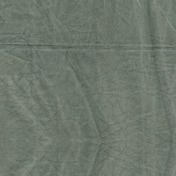 muted pine green aged muslin textured cotton quilting fabric by Marcus Fabrics