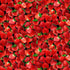 Fresh Fruit Packed Strawberries fabric by Timeless Treasures featuring realistic ripe red strawberries with green leaves on a black background in a vibrant digital print cotton fabric.