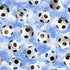Soccer balls breaking through nets on blue sky background digital print fabric by Timeless Treasures