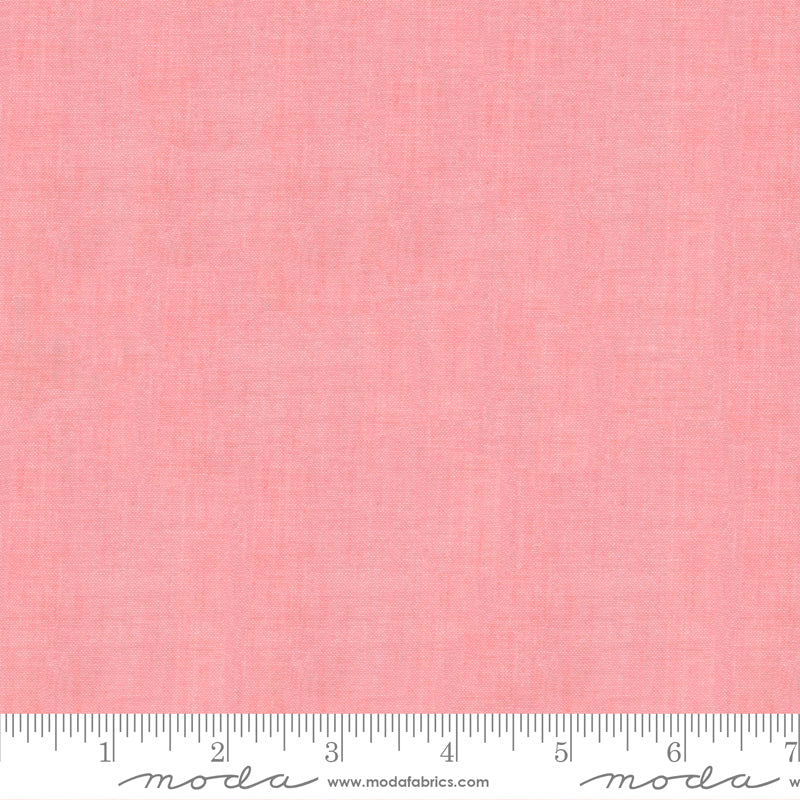 Crossweave Carnation woven cotton fabric featuring a soft carnation pink linen-look texture by Moda Fabrics.