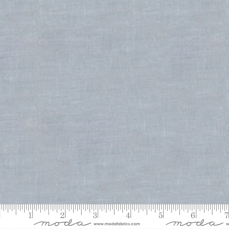 Crossweave Silver woven cotton fabric featuring a soft silver gray linen-look texture by Moda Fabrics.