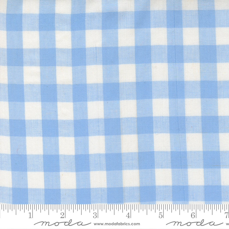 Summer Solstice Wovens Gingham Waterfall woven cotton fabric featuring a classic sky blue and ivory gingham pattern by Pieces To Treasure for Moda Fabrics.