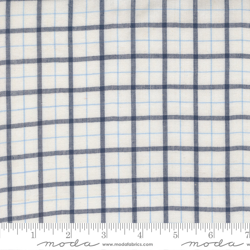 Summer Solstice Wovens Windowpane Nautical Blue woven cotton fabric featuring navy and sky blue windowpane plaid on an ivory background by Pieces To Treasure for Moda Fabrics.