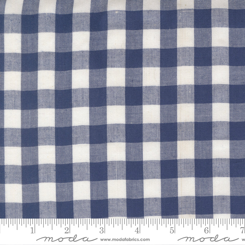 Summer Solstice Wovens Buffalo Check Nautical Blue woven cotton fabric featuring a classic navy blue and ivory buffalo check pattern by Pieces To Treasure for Moda Fabrics.