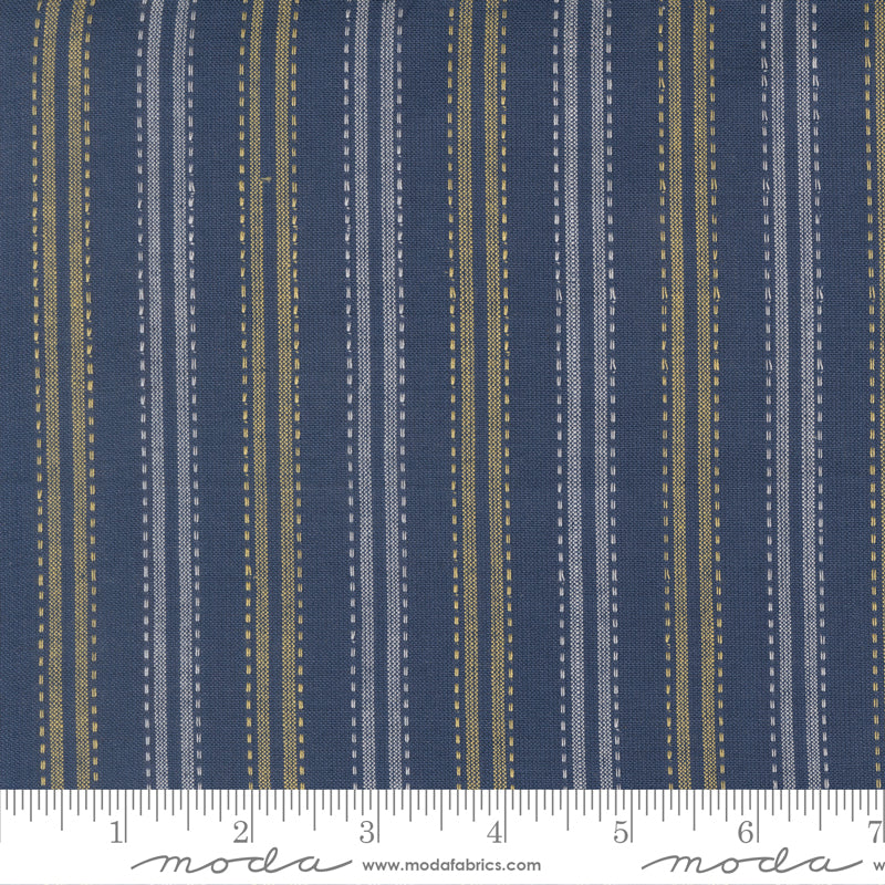 Summer Solstice Wovens Ticking Stripe Nautical Blue woven cotton fabric featuring navy blue, ivory, and golden ticking stripes by Pieces To Treasure for Moda Fabrics.