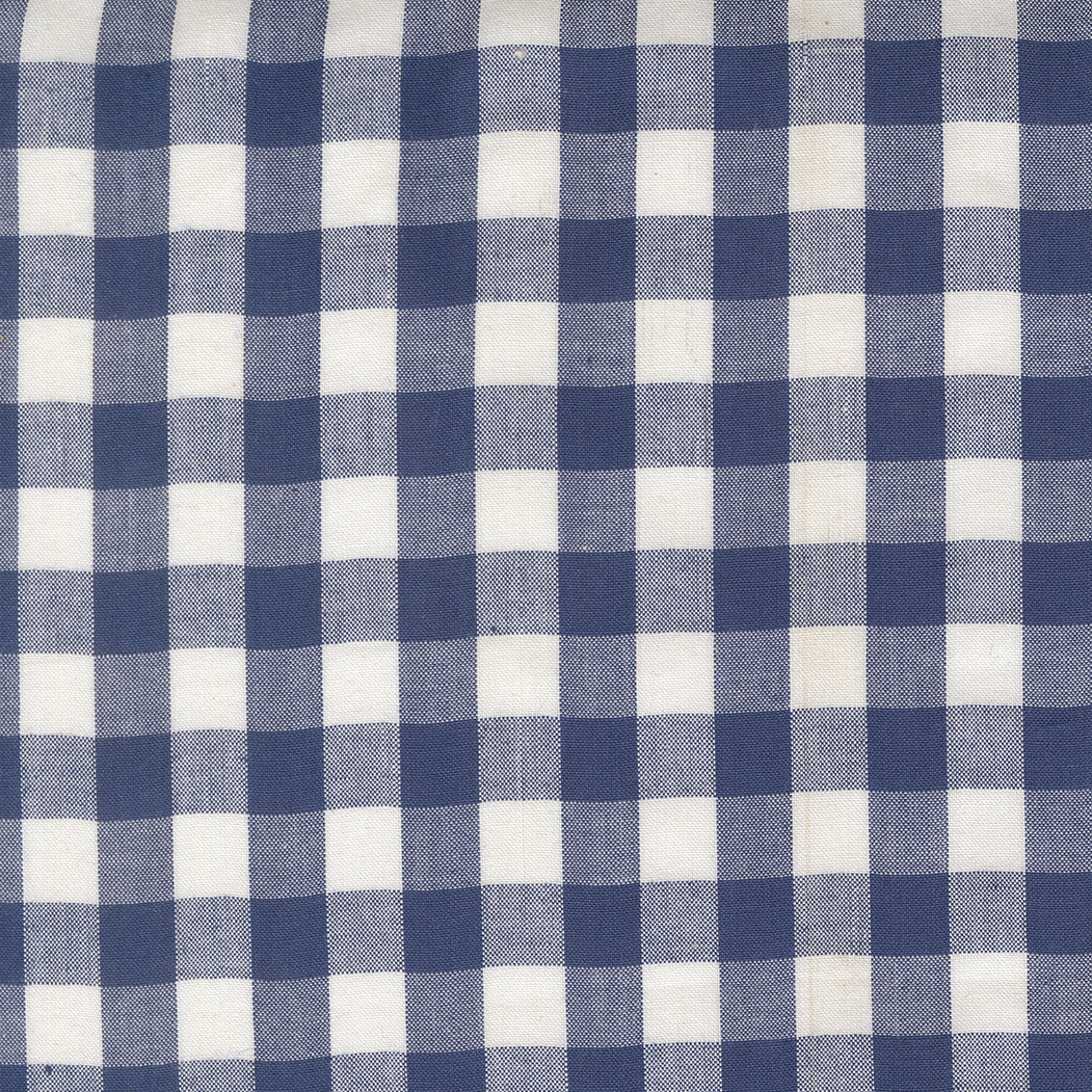 Summer Solstice Wovens Buffalo Check Nautical Blue woven cotton fabric featuring a classic navy blue and ivory buffalo check pattern by Pieces To Treasure for Moda Fabrics.