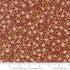 Morris Muse Clover Russet quilting cotton by Barbara Brackman for Moda Fabrics featuring delicate blush clover blossoms, tiny white flowers, and trailing botanical vines on a warm russet background.