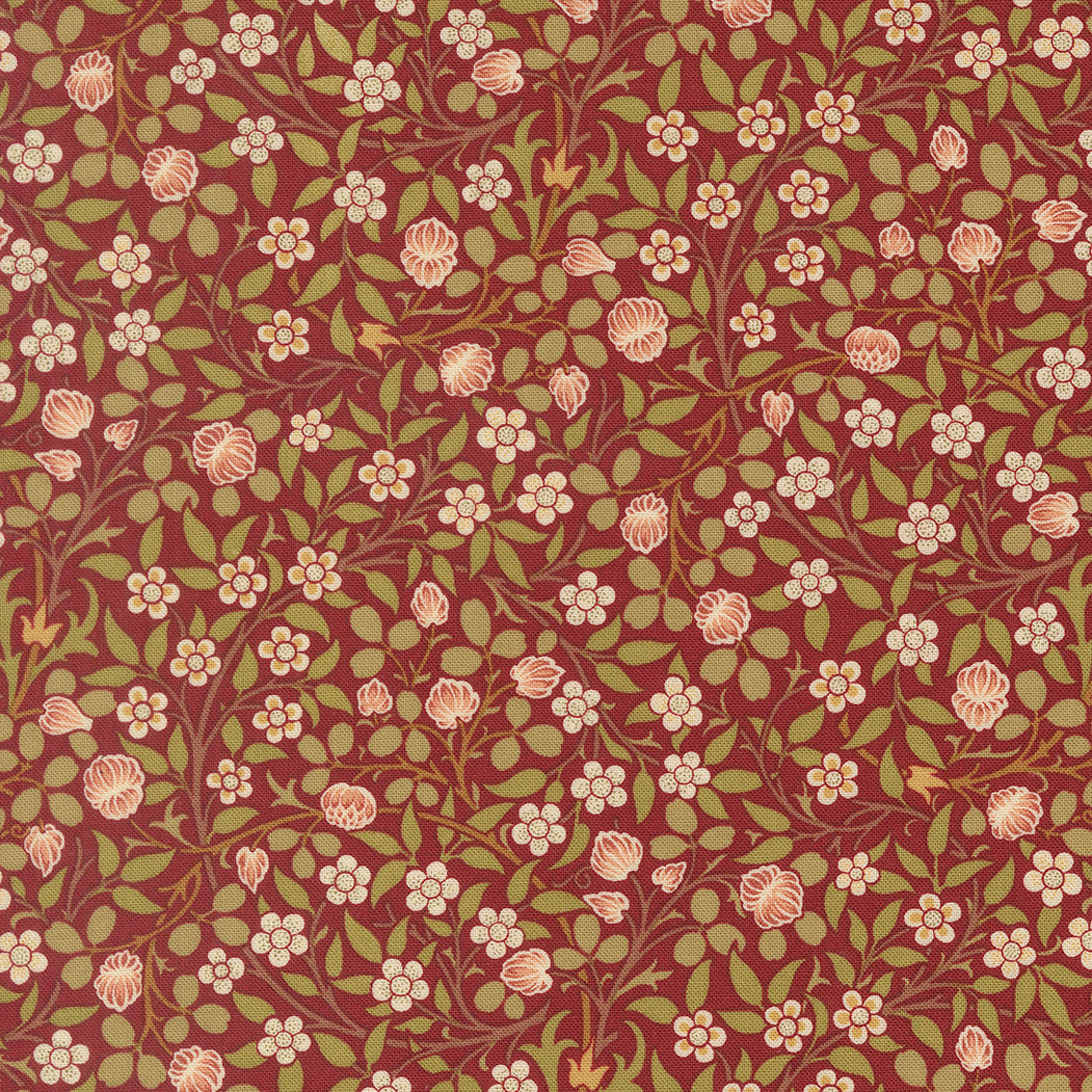 Morris Muse Clover Russet quilting cotton by Barbara Brackman for Moda Fabrics featuring delicate blush clover blossoms, tiny white flowers, and trailing botanical vines on a warm russet background.