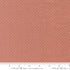 Tiny ring motif quilting cotton fabric on clay pink background by French General for Moda Fabrics