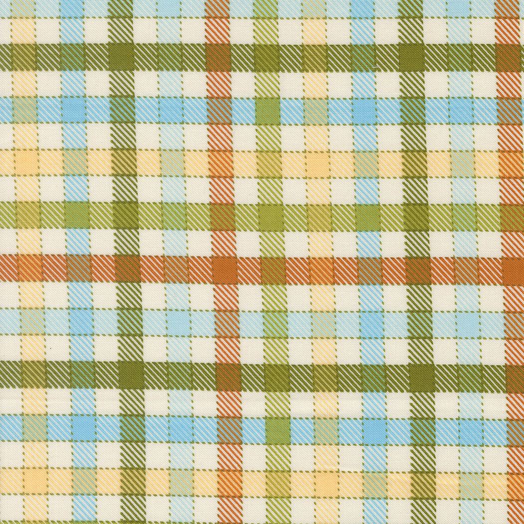 Animal Park Fun Checks Iguana fabric by Stacy Iest Hsu for Moda Fabrics featuring a colorful plaid design in green, blue, gold, rust, and cream on premium cotton.
