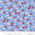 A close-up of 30s Playtime 2025 - Apple Blossom Florals Sky Fabric by Linzee McCray for Moda Fabrics, showing red apples and white blossoms on a soft sky-blue cotton background.