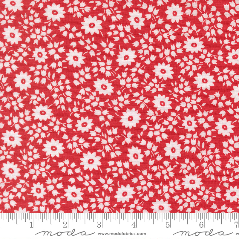 Close-up of 30s Playtime 2025 Perky Posies Scarlet Fabric by Linzee McCray for Moda Fabrics, featuring white floral clusters on a scarlet red background.