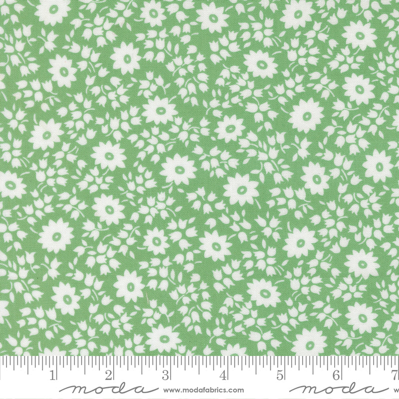 Close-up of 30s Playtime 2025 - Perky Posies Aloe Fabric by Linzee McCray for Moda Fabrics, featuring white floral silhouettes scattered across a soft aloe green cotton background in a vintage 1930s-inspired design.