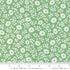 Close-up of 30s Playtime 2025 - Perky Posies Aloe Fabric by Linzee McCray for Moda Fabrics, featuring white floral silhouettes scattered across a soft aloe green cotton background in a vintage 1930s-inspired design.