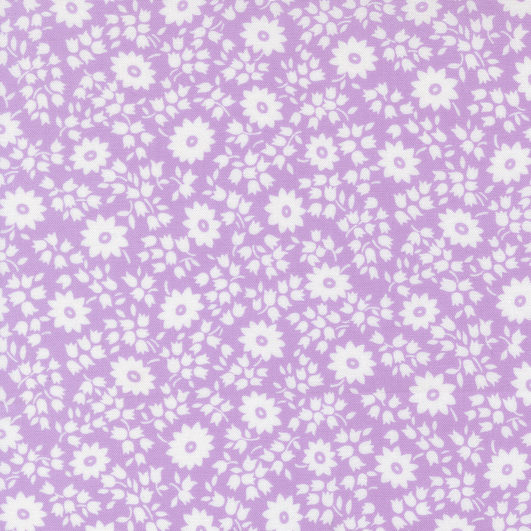 Close-up of 30s Playtime 2025 Perky Posies Lilac Fabric by Linzee McCray for Moda Fabrics, featuring white floral clusters on a soft lilac background.