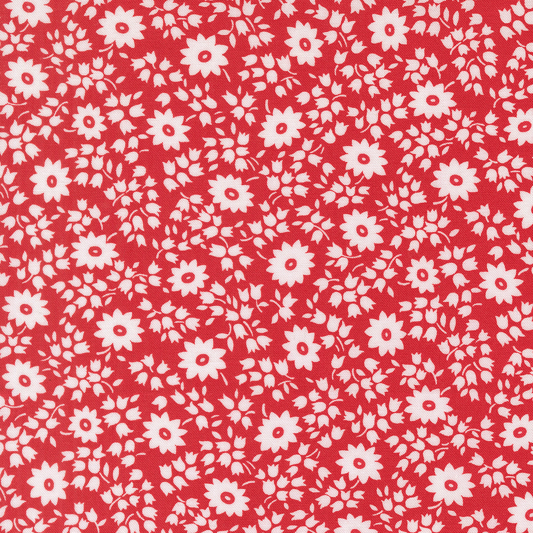 Close-up of 30s Playtime 2025 Perky Posies Scarlet Fabric by Linzee McCray for Moda Fabrics, featuring white floral clusters on a scarlet red background.
