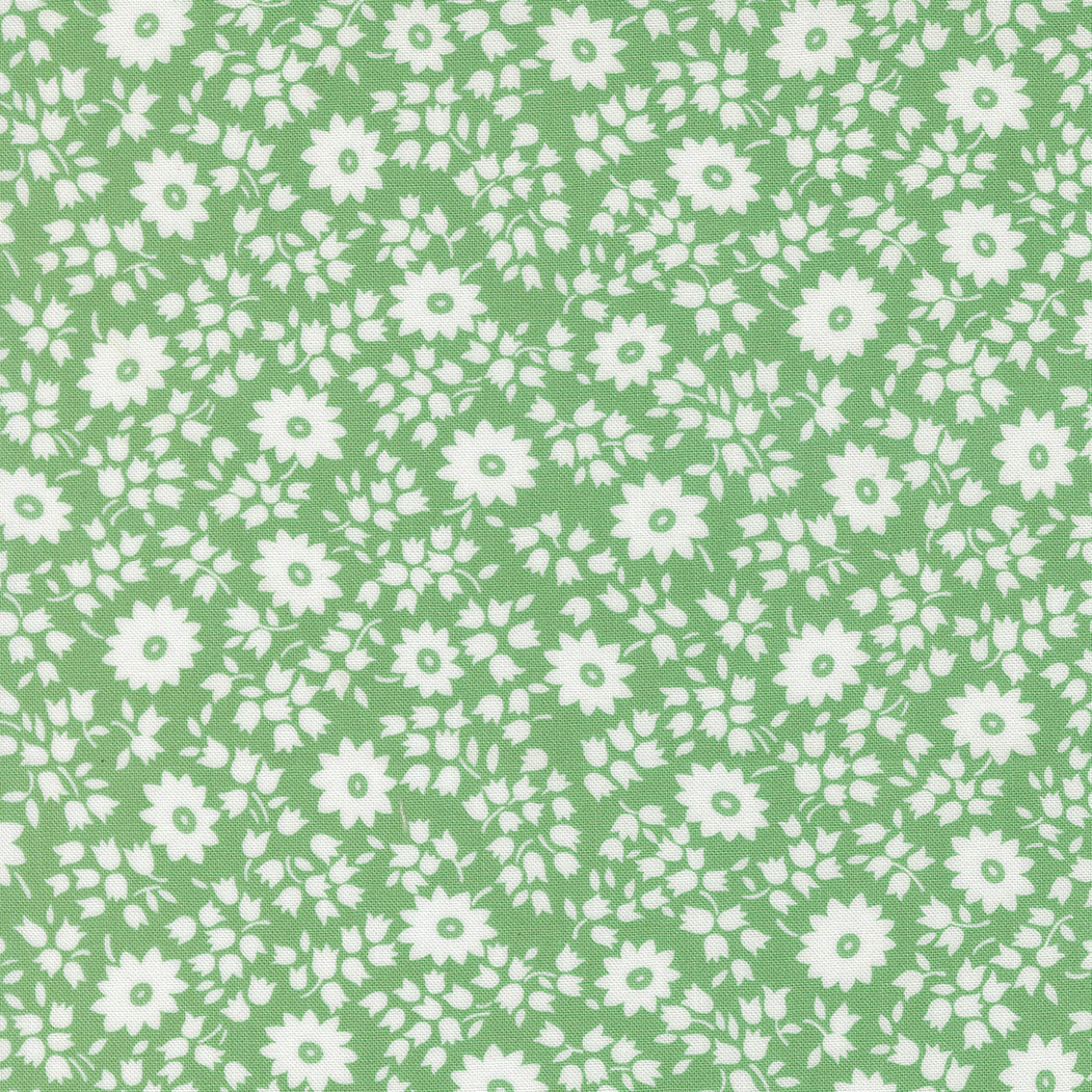 Close-up of 30s Playtime 2025 - Perky Posies Aloe Fabric by Linzee McCray for Moda Fabrics, featuring white floral silhouettes scattered across a soft aloe green cotton background in a vintage 1930s-inspired design.