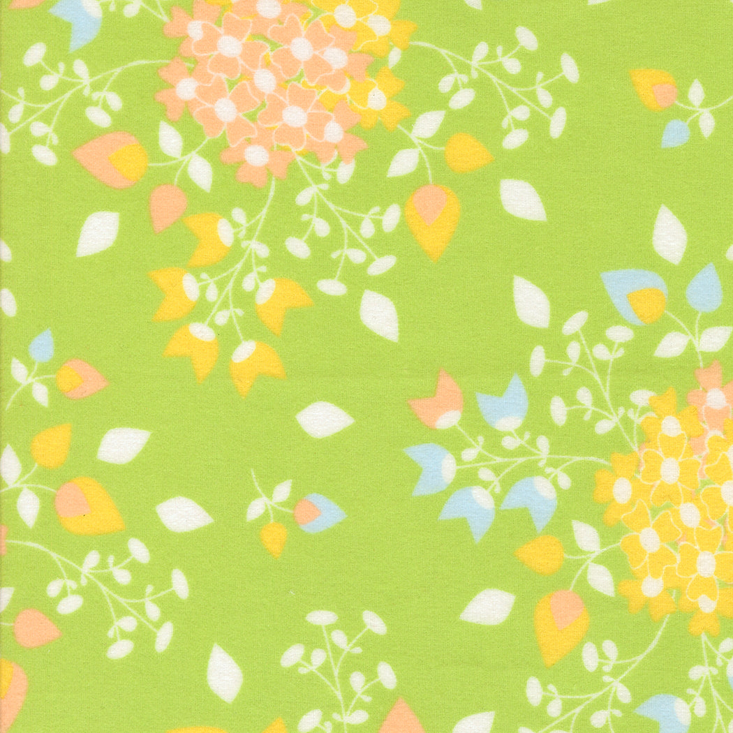 Sherbet Sunshine Leaf flannel fabric by Corey Yoder of Coriander Quilts for Moda Fabrics featuring pastel floral clusters on a green background.