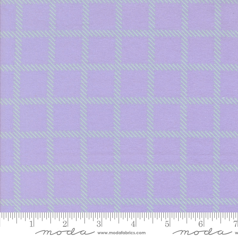 Sherbet Sunshine Cross Checks Lavender flannel fabric by Corey Yoder of Coriander Quilts for Moda Fabrics featuring a lavender and mint checkered pattern.
