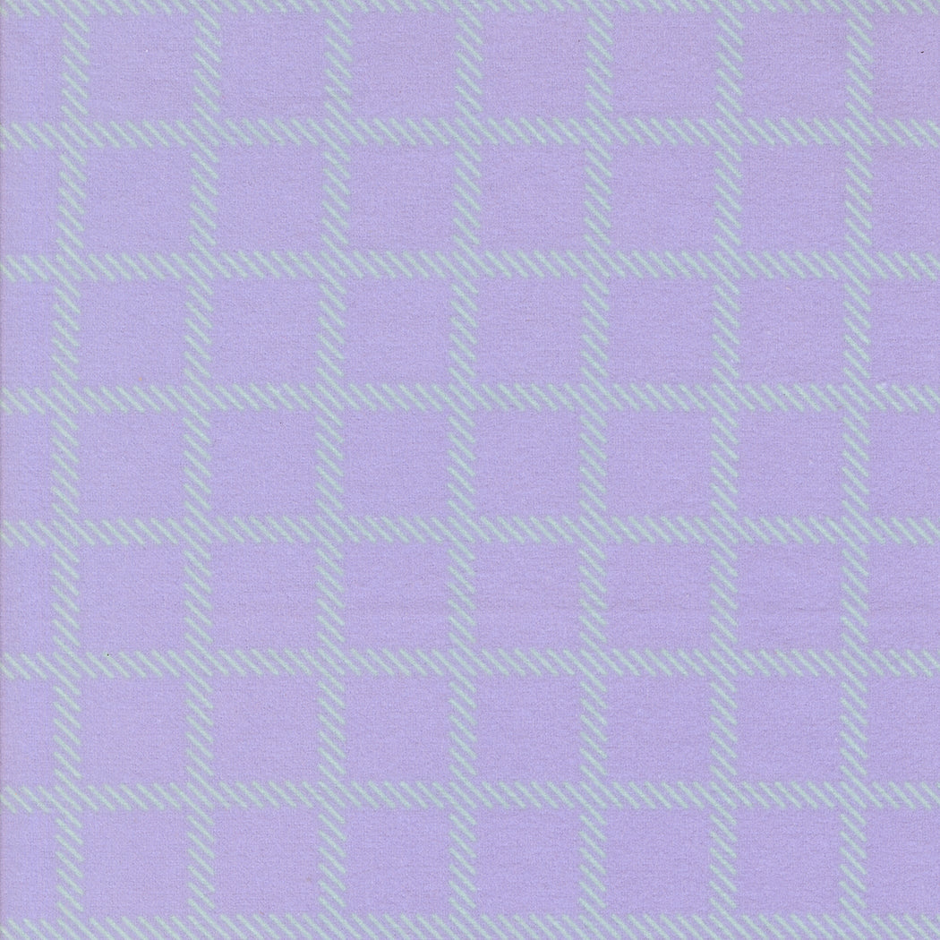 Sherbet Sunshine Cross Checks Lavender flannel fabric by Corey Yoder of Coriander Quilts for Moda Fabrics featuring a lavender and mint checkered pattern.