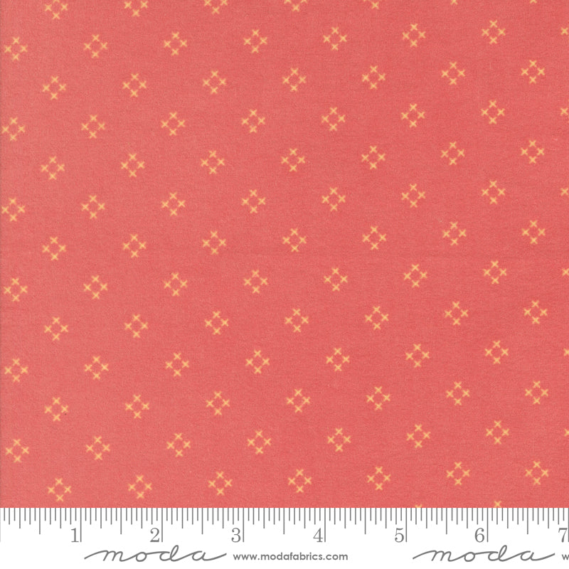Sherbet Sunshine Flannel Diamond X Strawberry fabric by Corey Yoder of Coriander Quilts for Moda Fabrics featuring small yellow diamond cross motifs on strawberry pink.