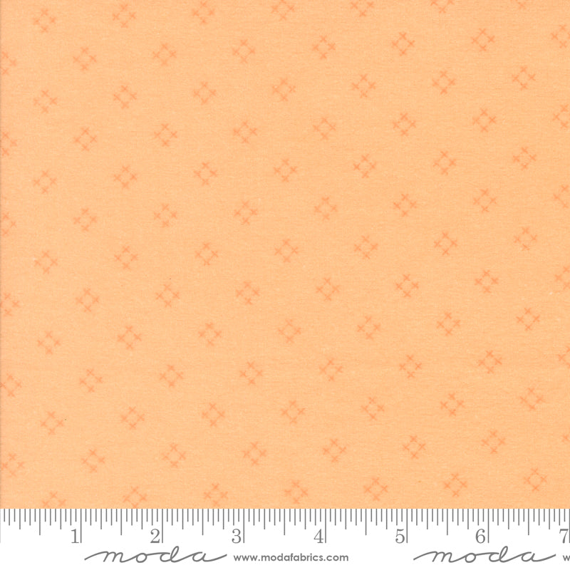 Sherbet Sunshine Flannel Diamond X Cantelope fabric by Corey Yoder of Coriander Quilts for Moda Fabrics featuring a soft orange diamond cross pattern on flannel.