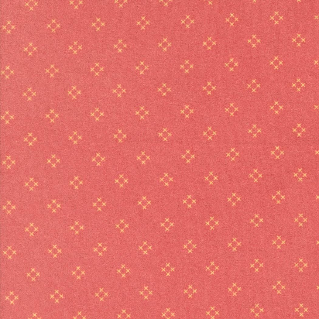 Sherbet Sunshine Flannel Diamond X Strawberry fabric by Corey Yoder of Coriander Quilts for Moda Fabrics featuring small yellow diamond cross motifs on strawberry pink.