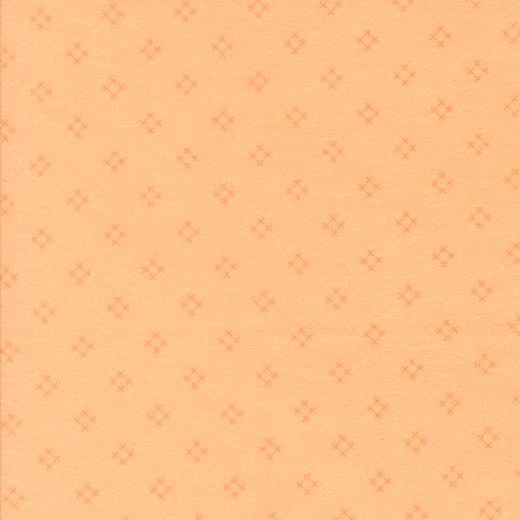 Sherbet Sunshine Flannel Diamond X Cantelope fabric by Corey Yoder of Coriander Quilts for Moda Fabrics featuring a soft orange diamond cross pattern on flannel.