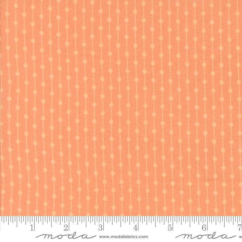 Sherbet Sunshine Flannel Stripe Melon fabric by Corey Yoder of Coriander Quilts for Moda Fabrics featuring vertical dotted stripe pattern in warm melon tones.