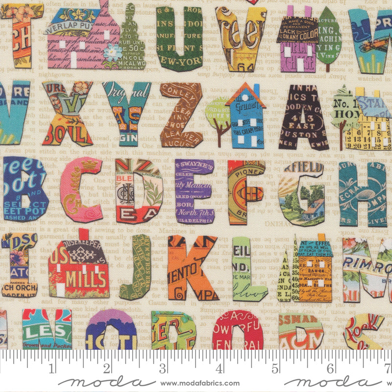 Alphabet collage quilting cotton fabric with vintage typography and paper ephemera by Cathe Holden for Moda Fabrics.