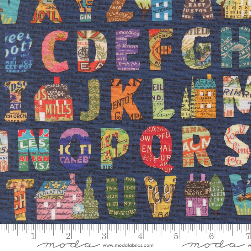 Colorful alphabet collage print on navy background by Cathe Holden for Moda Fabrics.