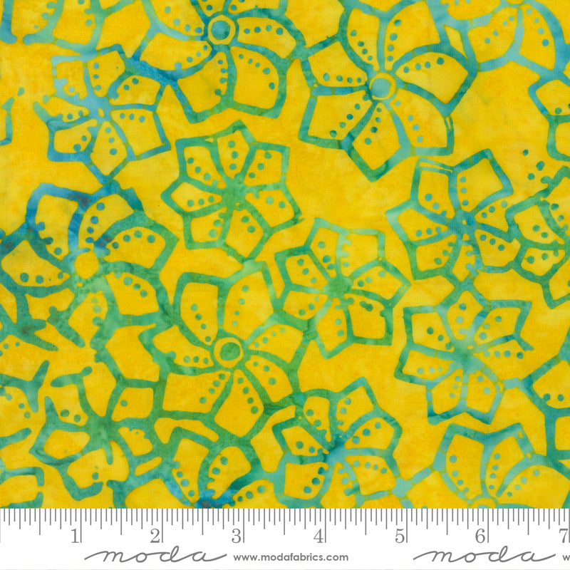 Sunburst Batiks Sun fabric by Moda Fabrics featuring turquoise tropical floral blooms on a vibrant sunshine yellow premium batik cotton background.