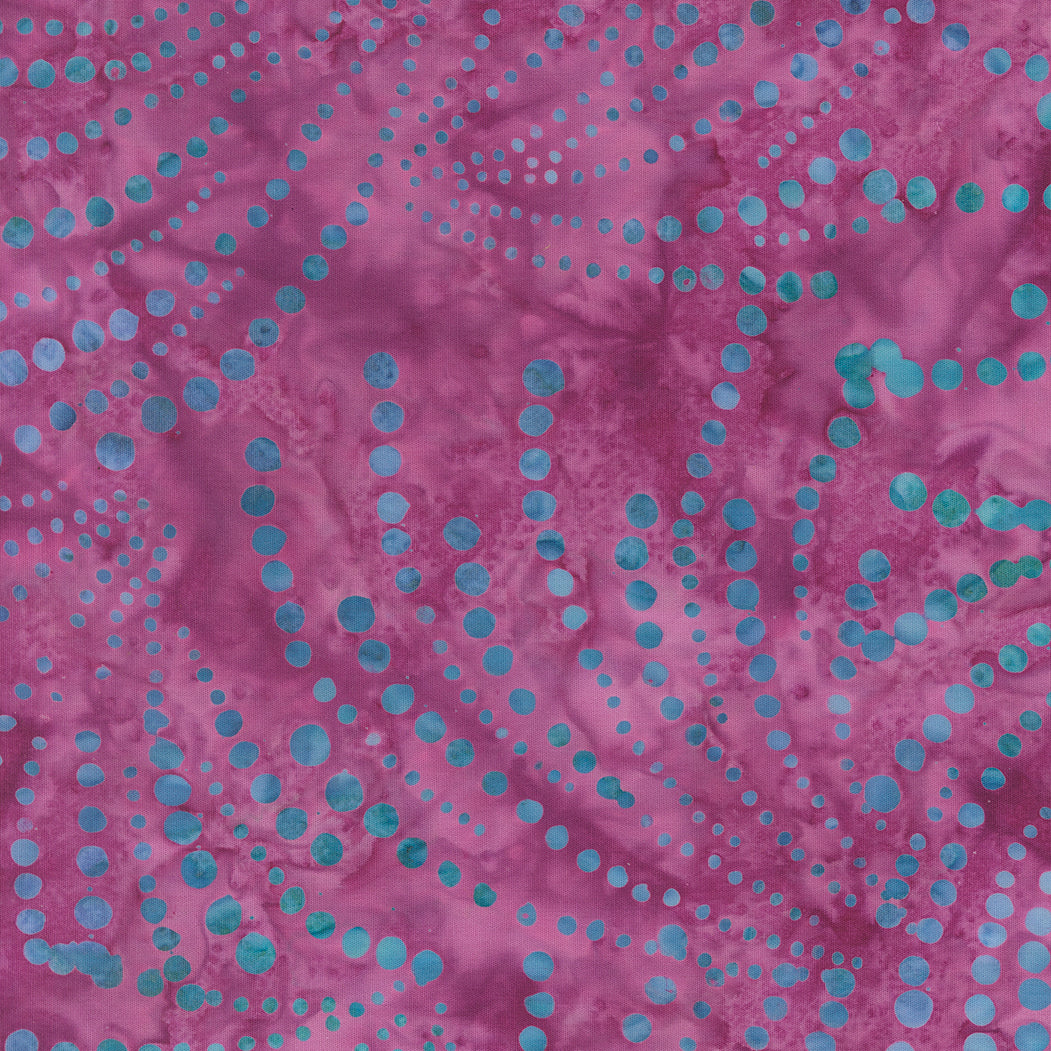 Sunburst Batiks Grape fabric by Moda Fabrics featuring swirling turquoise dotted sunburst patterns on a rich grape purple batik background.