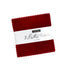 3 Sisters Solids Mini Charm Pack by Moda Fabrics containing 42 assorted 2.5-inch solid fabric squares.