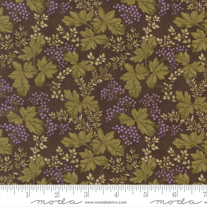 Collections Essence Florals Soil fabric by Howard Marcus for Moda Fabrics featuring olive green botanical leaves and lavender berry clusters on a rich brown background.