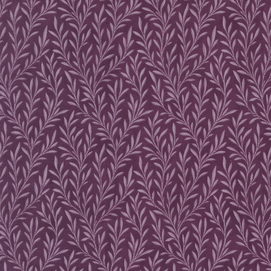 Collections Essence Trailing Vines Plum fabric by Howard Marcus for Moda Fabrics featuring elegant lavender trailing vines on a rich plum background.