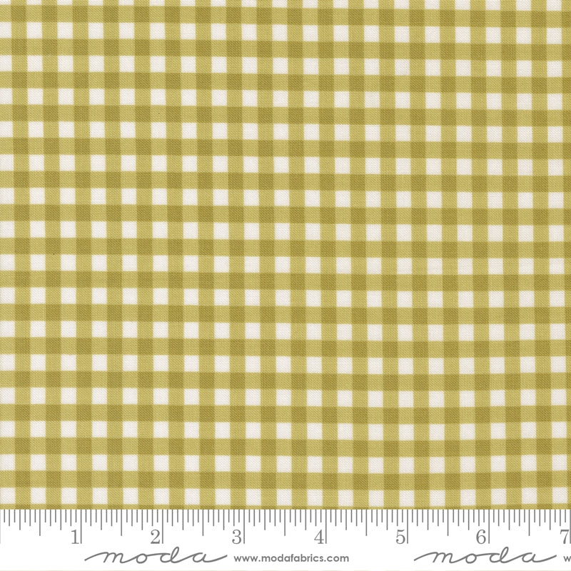 Lucky Gingham Grass cotton fabric by Sweetwater for Moda Fabrics showing green and white small checks.