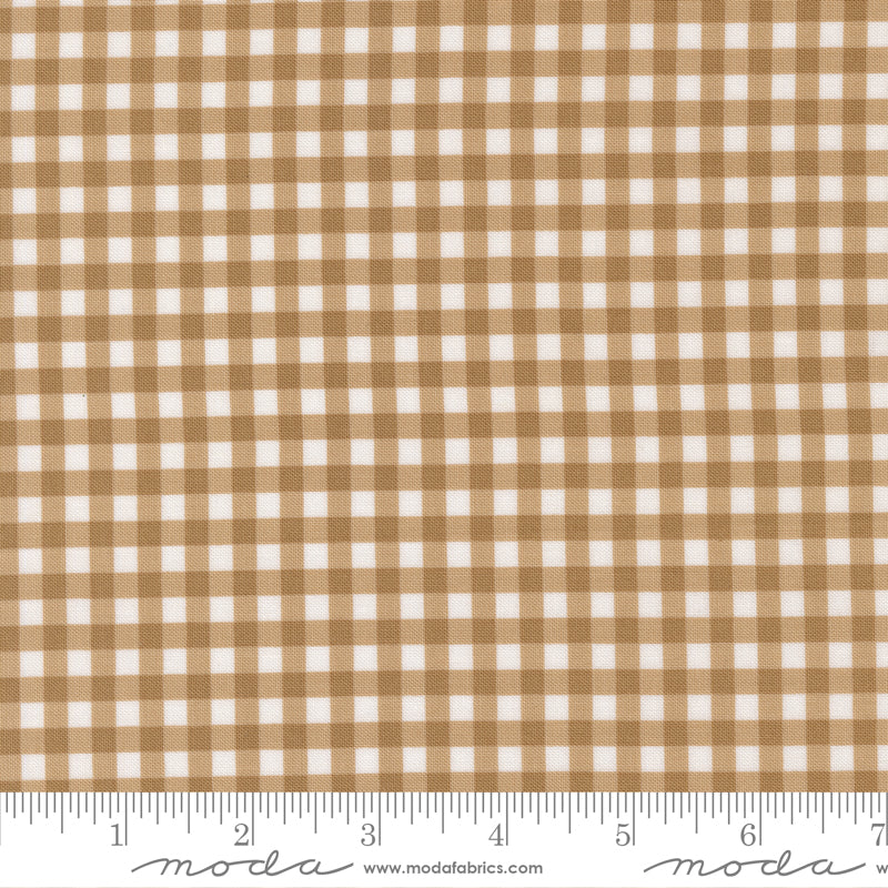 Lucky Gingham Sand cotton fabric by Sweetwater for Moda Fabrics showing tan and white check pattern.