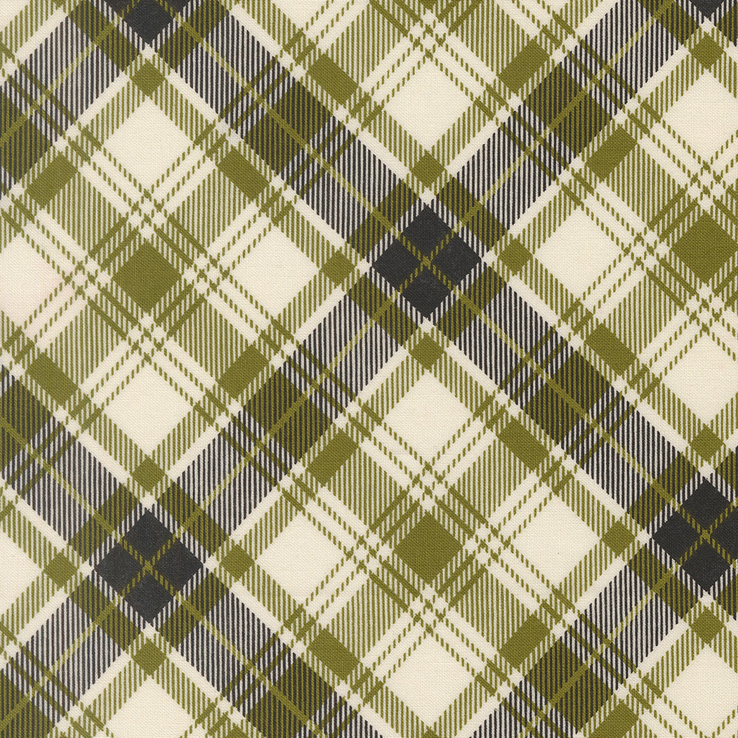 Chilly Christmas Plaid Pine premium quilting cotton featuring a pine green, charcoal, and ivory tartan plaid by Sweetwater for Moda Fabrics.