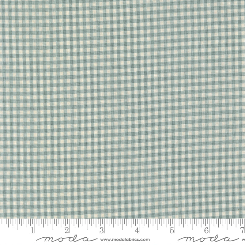 Chilly Gingham Storm premium quilting cotton featuring a soft blue-gray and ivory gingham plaid by Sweetwater for Moda Fabrics.