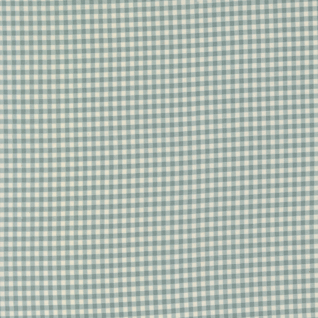 Chilly Gingham Storm premium quilting cotton featuring a soft blue-gray and ivory gingham plaid by Sweetwater for Moda Fabrics.