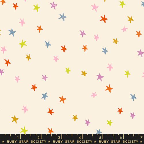 Starry Multi cotton fabric by Ruby Star Society with colorful stars on a soft natural cream background.