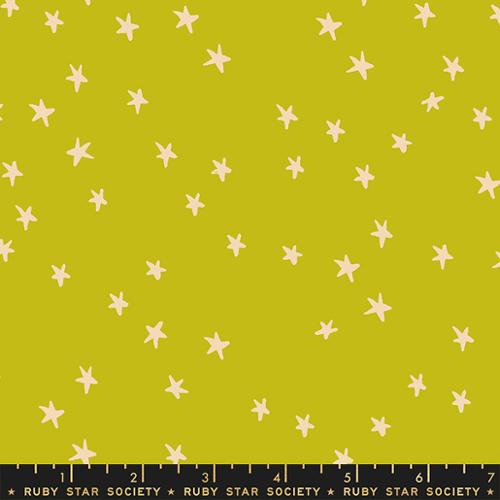 Starry Pistachio fabric by Alexia Abegg for Ruby Star Society featuring scattered cream stars on a fresh pistachio green background.